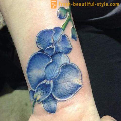 Flower tattoo on the wrist for girls. Value