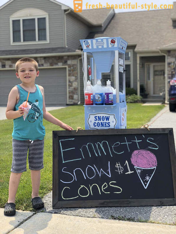 The boy opened his business in order to earn a bike