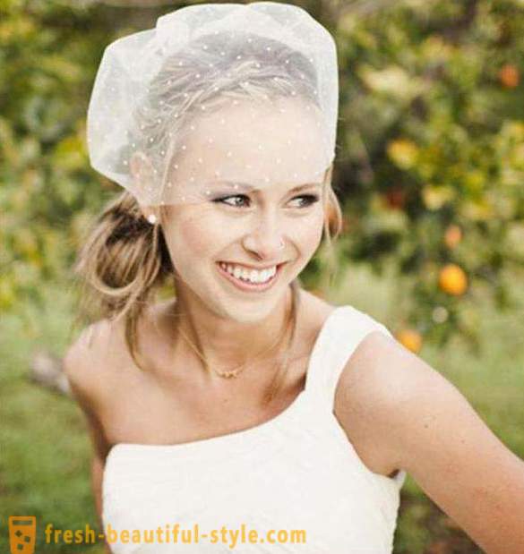 Wedding hairstyle for medium hair with a veil with their hands (photo)